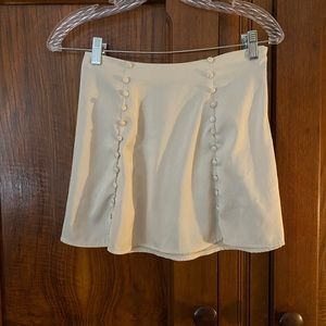 Urban Outfitters satiny cream faux button down skirt
